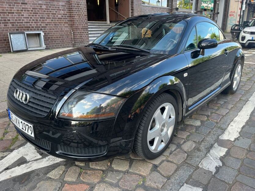 TT