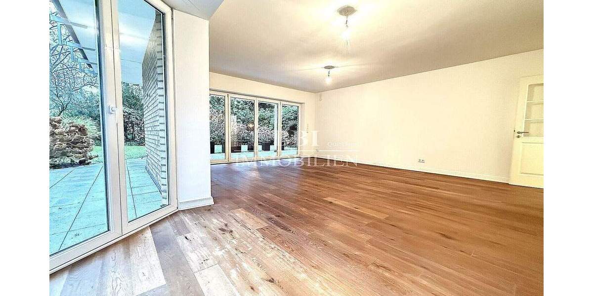 Erdgeschosswohnung mit Südgarten und 2 TG - Stilvolles Wohnen in privater Atmosphäre 4 zimmer