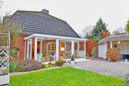 Lichtdurchfluteter 4-Zi.-Doppelhaustraum mit Wintergarten, Kamin, Sauna und Gartenidylle 4 zimmer