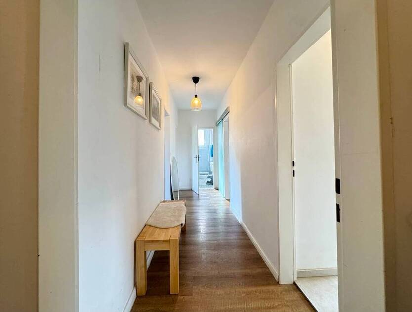 Sonnige Terrassenwohnung mit eigenem Gartenanteil