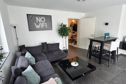 Moderne 2-Zimmer-Wohnung mit Balkon und eigenem Gartenanteil