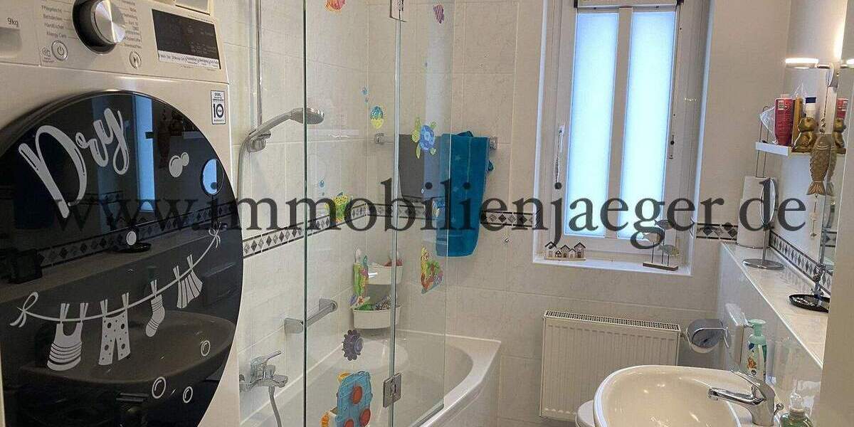 Kohfurth in 2.Hausreihe - helle Eckwohnung im Hochparterre mit Terrasse - 2x Bäder, EBK, TG möglich 4 zimmer