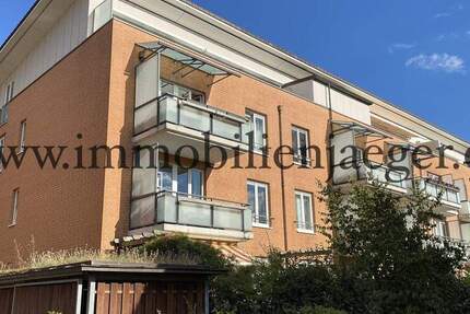 Kohfurth in 2.Hausreihe - helle Eckwohnung im Hochparterre mit Terrasse - 2x Bäder, EBK, TG möglich 4 zimmer