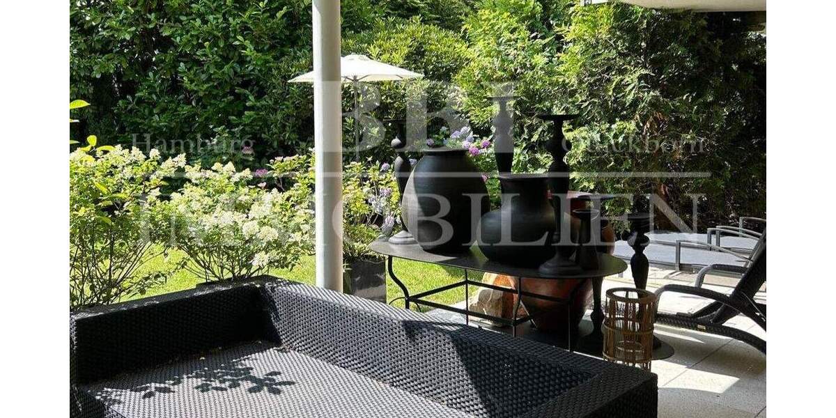 Erdgeschosswohnung mit Südgarten und 2 TG - Stilvolles Wohnen in privater Atmosphäre 4 zimmer