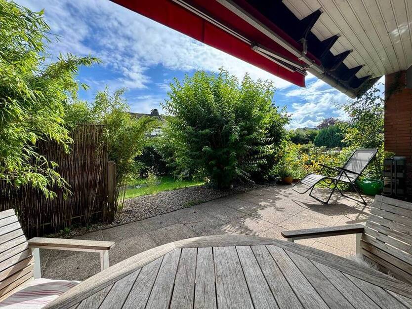 Sonnige Terrassenwohnung mit eigenem Gartenanteil