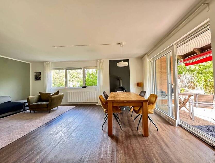 Sonnige Terrassenwohnung mit eigenem Gartenanteil