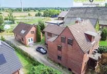 Zweifamilienhaus + Gewerbegebäude auf knapp 2 Hektar Land