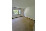 Zentrale Wohnlage, ruhige Umgebung. Endetage mit Balkon und TG-Stellplatz