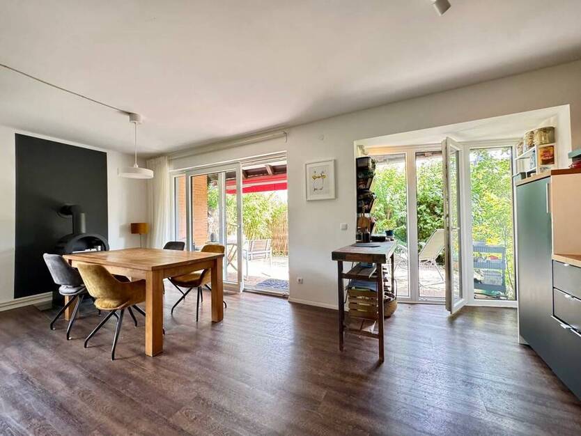 Sonnige Terrassenwohnung mit eigenem Gartenanteil