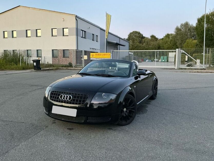 TT