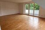 Helle Dachgeschoßwohnung mit Südbalkon plus 60m² Stauraum
