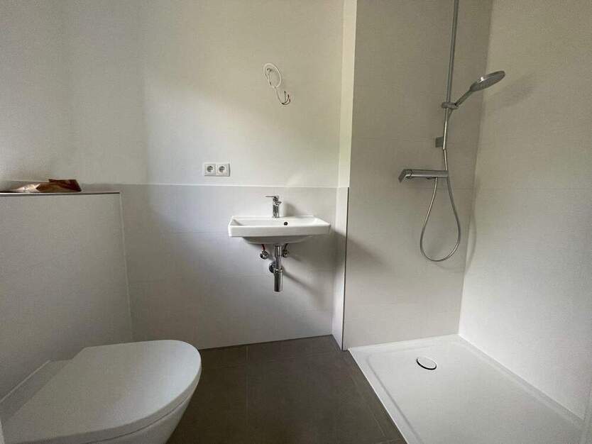 Neubau hochwertiges A+ Rotklinker-Effizienzhaus 40 in bester Villenlage.