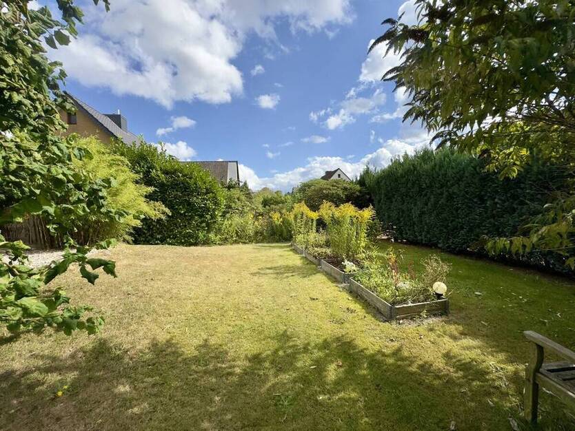 Sonnige Terrassenwohnung mit eigenem Gartenanteil
