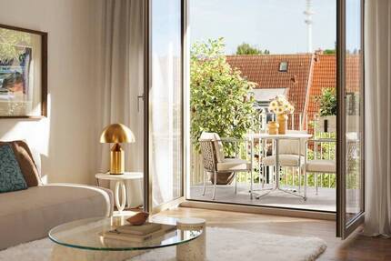 Großzügige 2 Zimmerwohnung mit Balkon und Dachterrasse mit Blick in den Himmel