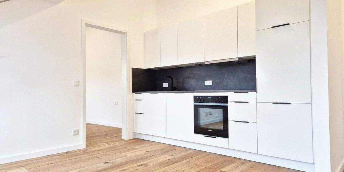 Neubau-Dachgeschosswohnung in charmantem Bestandshaus 2 zimmer